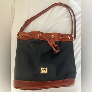 Dooney & Bourke Black and Brown Bucket Bag with Timeless Elegance